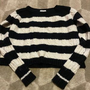 Subdued blue and white striped sweater